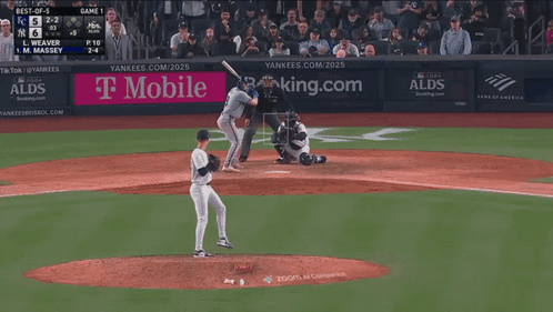 Baseball Game in Front of T Mobile Sign