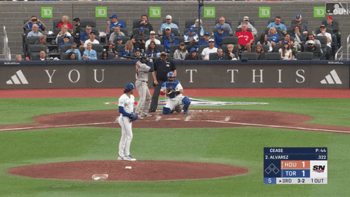Baseball Game in Front of You This Sign