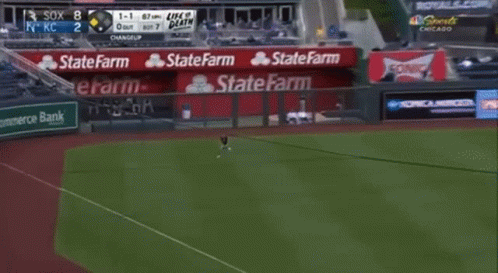 Baseball Game in Stadium with Advertisements