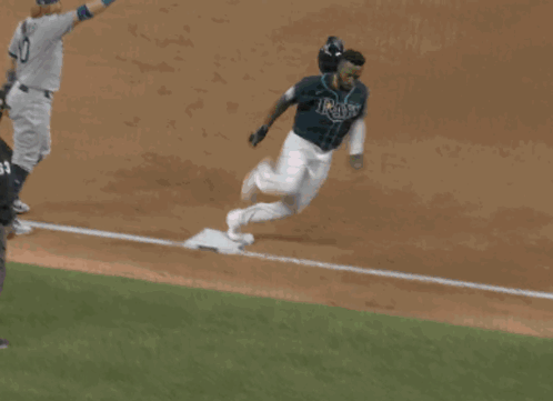 Baseball Game in Stadium With Chevrolet Advertisement