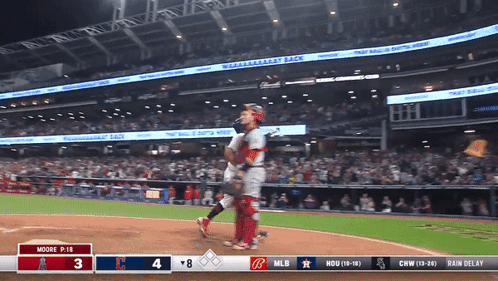 Baseball Game in Stadium With Scoreboard Saying Moore P 18