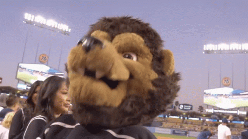 Baseball Mascot With 76 on Stadium
