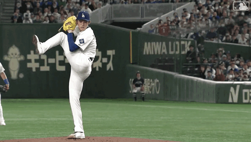 Baseball Pitcher Winding Up at Miwa Sign