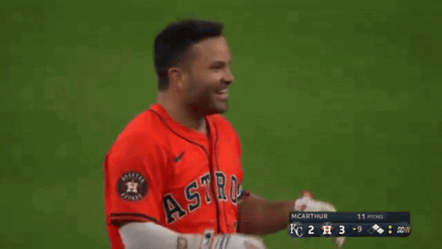 Baseball Player Clapping in Red Jersey