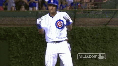 Baseball Player Dancing in Cubs Uniform