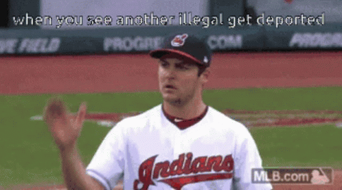 Baseball Player For Indians Waving Hand On Field