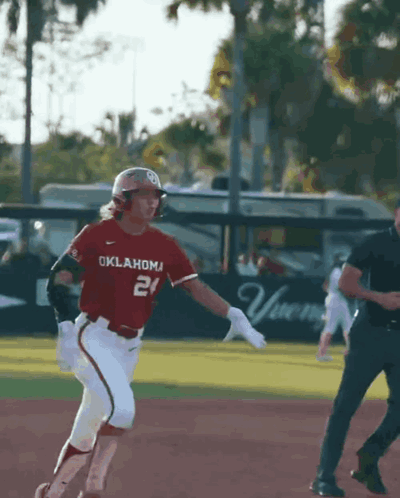 Baseball Player From Oklahoma Running Towards Base