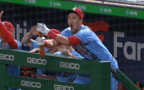 Baseball Player Holding Bat GIF