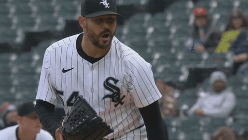 Baseball Player Holding Glove