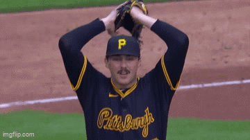 Baseball Player Holding Glove Over Head