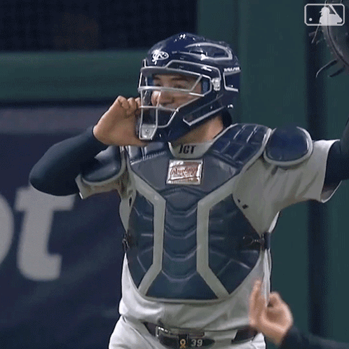 Baseball Player Hugging Teammate