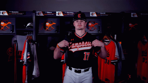 Baseball Player in Black and Orange Uniform