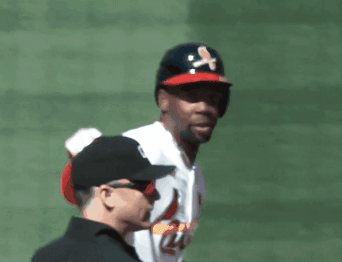 Baseball Player In Black Crossbones Hat GIF