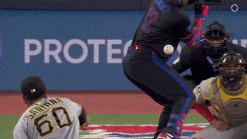 Baseball Player in Black Jersey Number 12