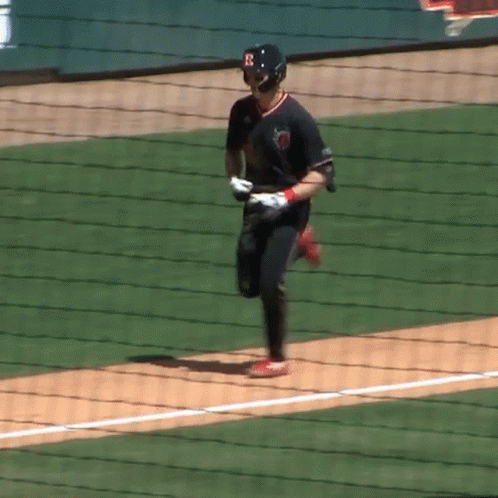 Baseball Player in Black Jersey With Letter F Running