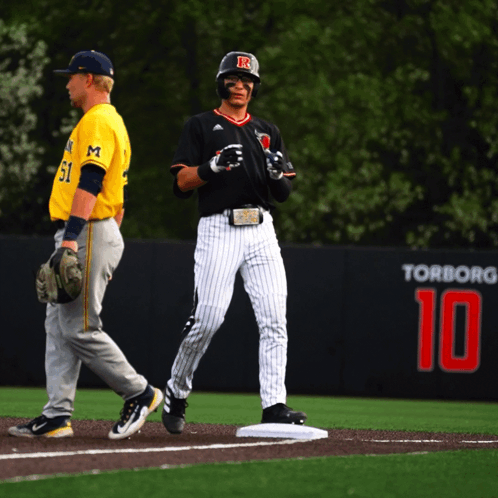 Baseball Player in Black Jersey With Letter R
