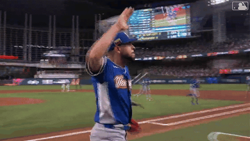 Baseball Player In Blue And White Texas Jersey GIF