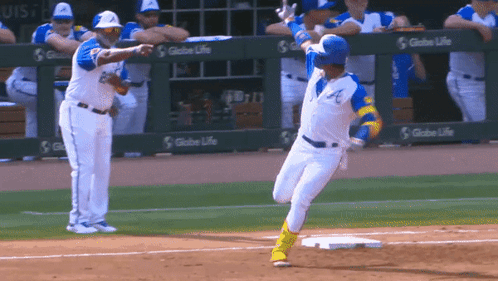 Baseball Player In Blue And White Uniform GIF