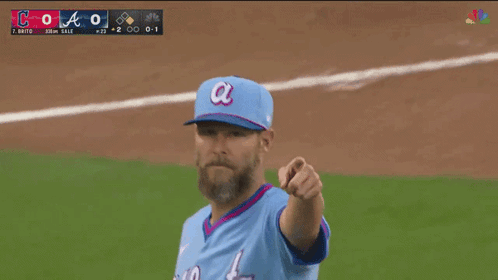 Baseball Player in Blue Atlanta Jersey