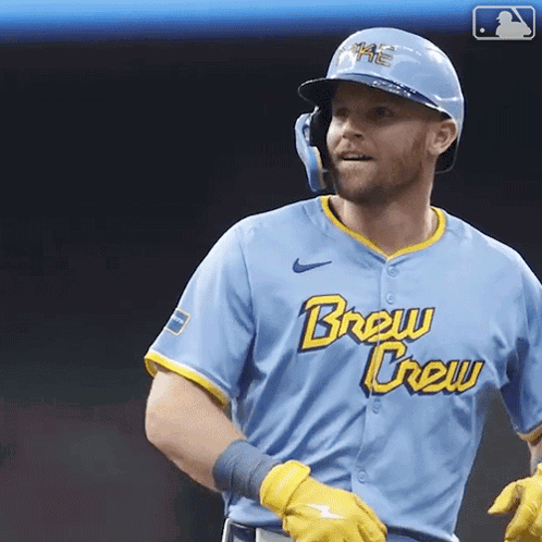 Baseball Player in Blue Brew Crew Jersey