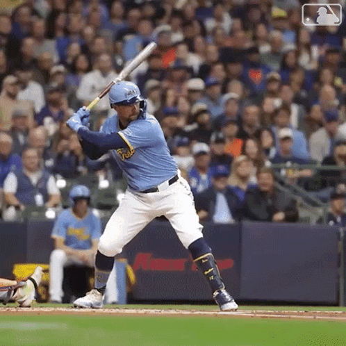 Baseball Player in Blue Brewers Jersey