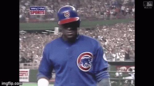 Baseball Player in Blue Cubs Jersey Stands on Field