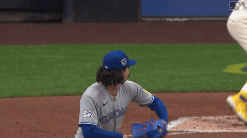 Baseball Player in Blue Jersey Number 5