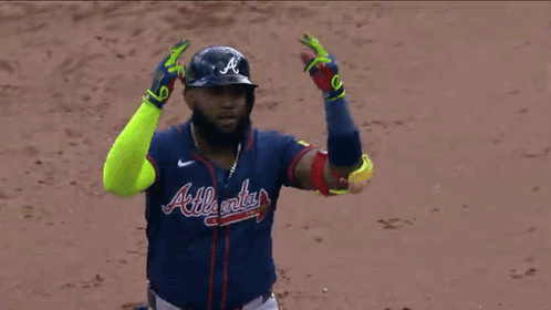 Baseball Player In Blue Jersey Shaking Hands GIF