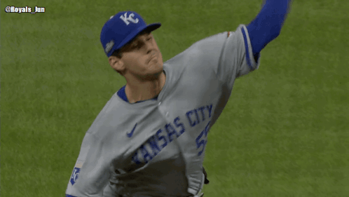 Baseball Player in Blue KC Hat