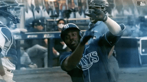 Baseball Player in Blue Rays Jersey