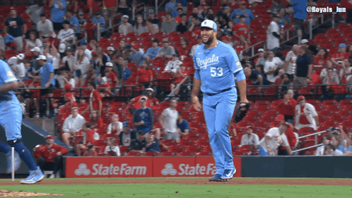 Baseball Player in Blue Royals Jersey