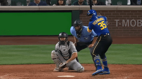 Baseball Player in Blue Seattle Jersey Running