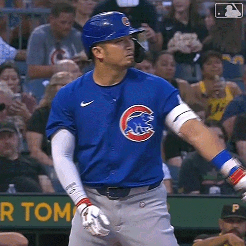 Baseball Player in Blue Uniform With Cubs Logo