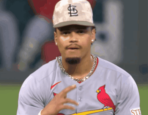 Baseball Player in Cardinals Jersey and Hat With Letter S