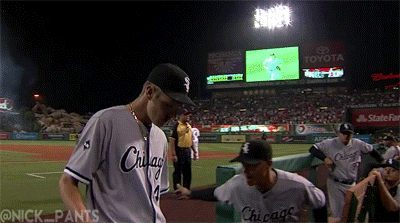 Baseball Player in Chicago Jersey Talking to Another Player