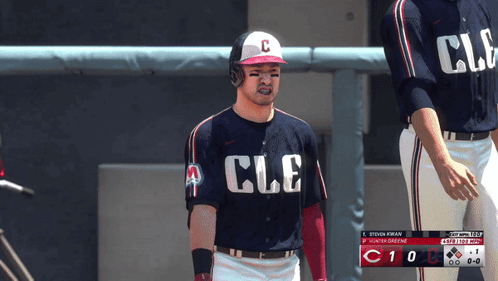 Baseball Player in CLE Jersey in Dugout