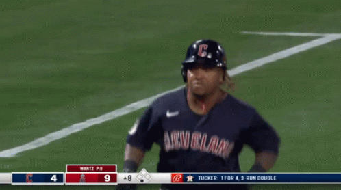 Baseball Player in Cleveland Jersey Running