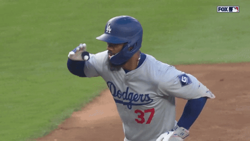 Baseball Player in Dodgers Jersey and Helmet
