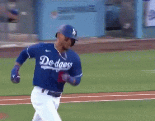 Baseball Player in Dodgers Jersey Running