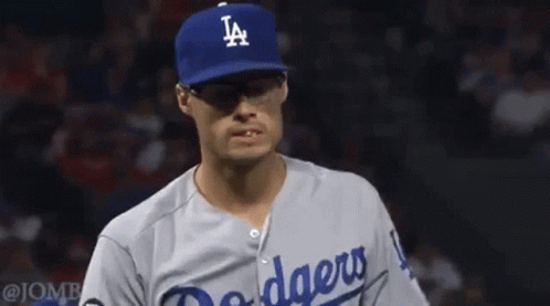 Baseball Player in Dodgers Uniform and LA Hat