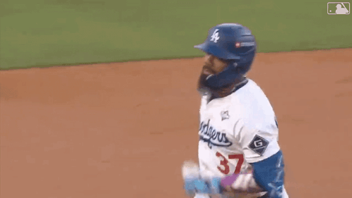 Baseball Player in Dodgers Uniform Running