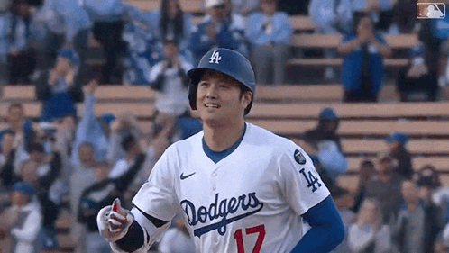 Baseball Player In Dodgers Uniform Standing On Field GIF