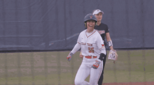 Baseball Player in Front of Sign Saying Onemary