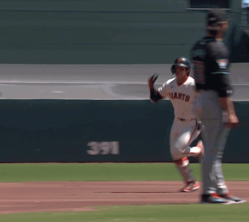 Baseball Player in Giants Jersey Running