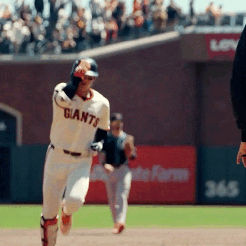 Baseball Player in Giants Uniform Running