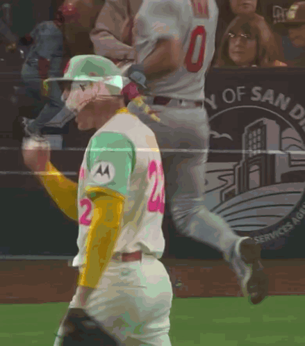 Baseball Player in Green Jersey Number 2