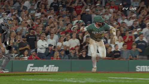 Baseball Player in Green Red Sox Jersey Running