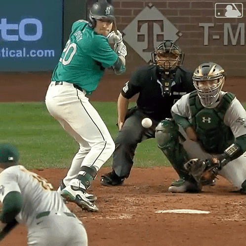 Baseball Player in Green Uniform Number 10