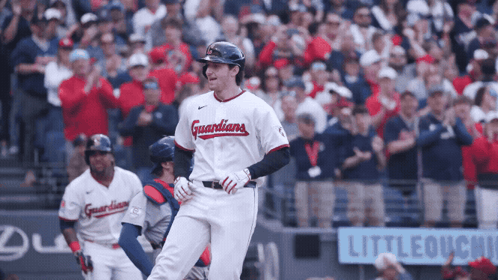 Baseball Player in Guardians Jersey Walking to Base
