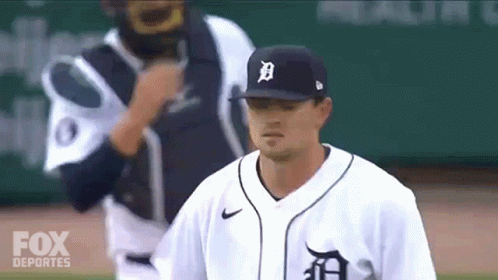 Baseball Player in Hat With Letter B
